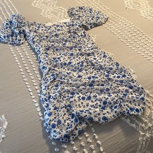 all in favor size med blue flowered/white dress -nordstorms fits like a small